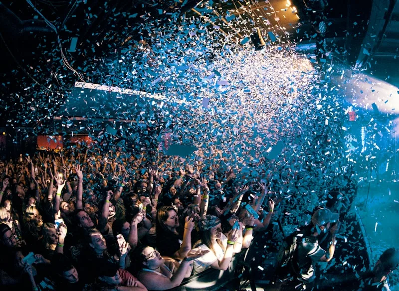 Host and event vendor shaking hands after a successful celebration
